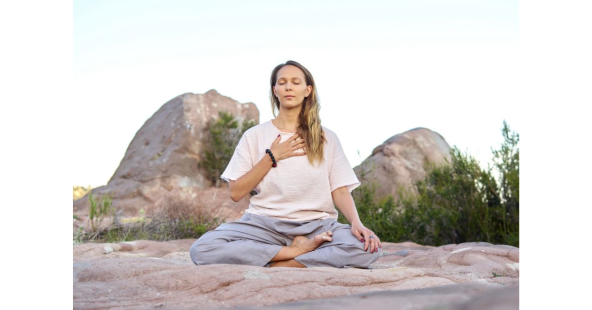 a women doing meditation